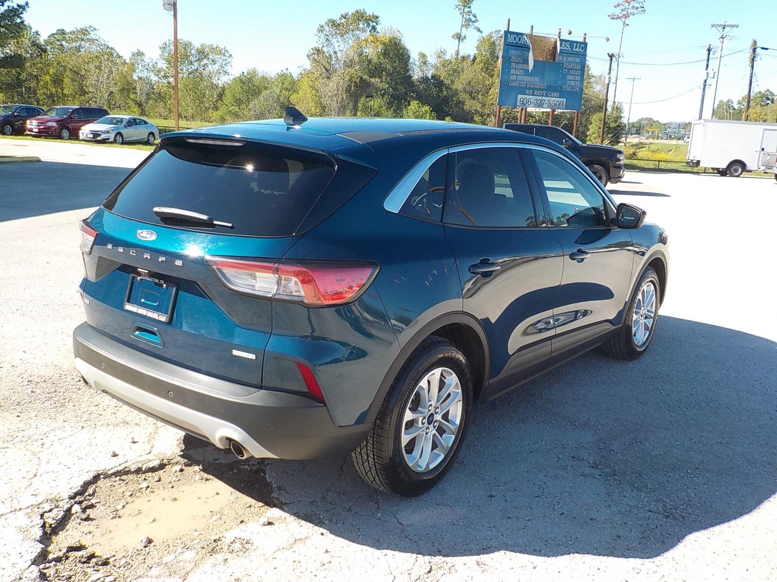 2020 Green Ford Escape (1FMCU0G69LU) with an 3 cyl engine, Automatic transmission, located at 1617 W Church Street, Livingston, TX, 77351, (936) 327-3600, 30.710995, -94.951157 - Love these!! Great economy in a comfortable ride! - Photo #6